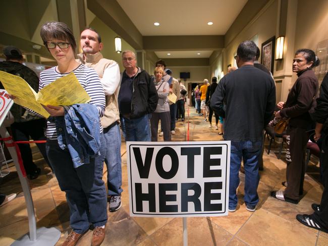 Voters line-up to cast their ballots at a polling station set up at Noonday Baptist Church for the mid-term elections in Marietta, Georgia. Picture: AFP