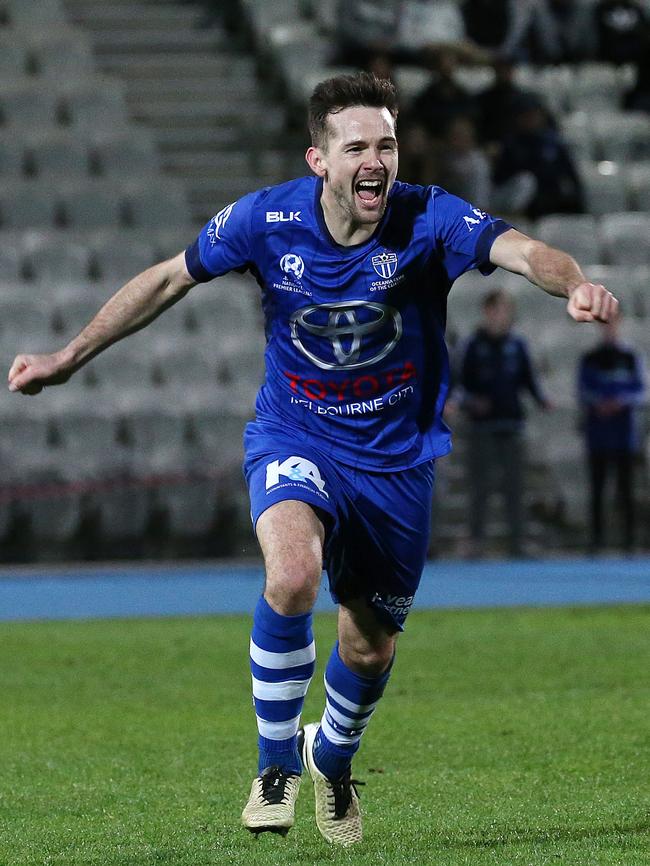 Matthew Foschini celebrates South Melbourne’s win over the Oakleigh Cannons in the 2016 grand final Picture: George Salpigtidis