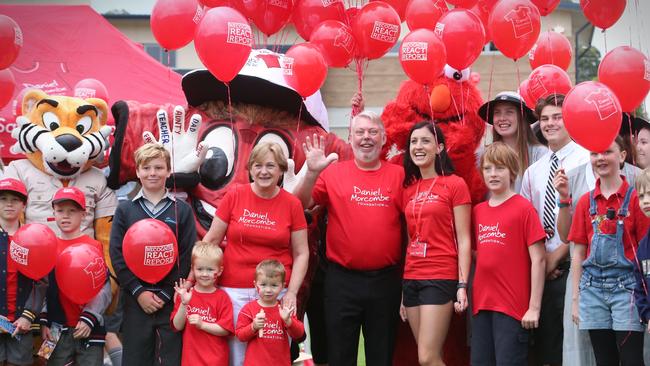 Bruce and Denise Morcombe surrounded by students in the Walk for Daniel at Woombye. Picture: Jamie Hanson