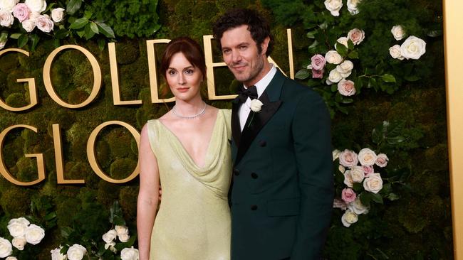 Adam Brody (R) and Leighton Meester at the Golden Globes this week. Picture: Etienne Lauren/AFP