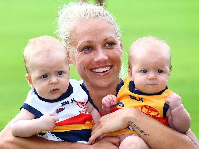 Erin Phillips with 4 month old twins Blake and Brooklyn enjoy winning the Women's AFLW Grand Final between the Brisbane Lions and Adelaide Crows at Metricon Stadium on the Gold Coast. Pics Adam Head