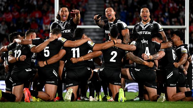 Joseph Tapine, James Fisher-Harris and Leo Thompson lead the haka ahead of a 2024 Rugby League Pacific Championship match.