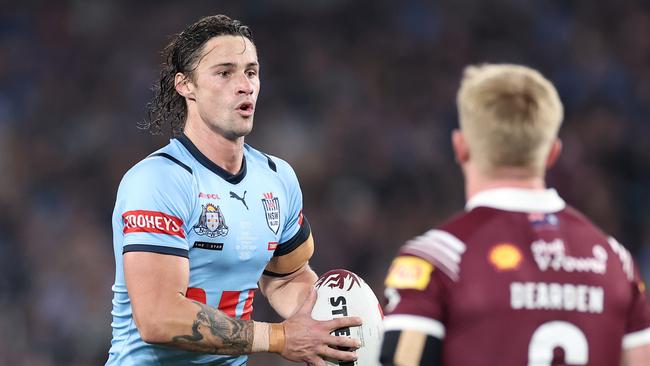 SYDNEY, AUSTRALIA - JUNE 05:  Nicho Hynes of the Blues runs the ball during game one of the 2024 Men's State of Origin Series between New South Wales Blues and Queensland Maroons at Accor Stadium on June 05, 2024 in Sydney, Australia. (Photo by Cameron Spencer/Getty Images)