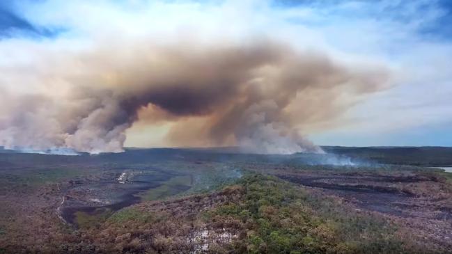 Smoke rises from a massive fire burning on Fraser Island last year. Photo: Glen Winney