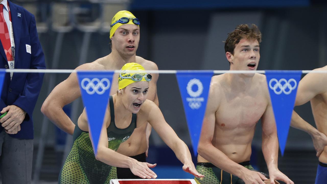 Kaylee McKeown, Matthew Temple and Izaac Stubblety-Cook cheer on Emma McKeon. Picture: Alex Coppel.