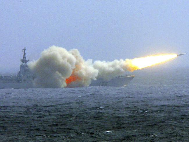 A destroyer of the South China Sea Fleet fires a missile during a training exercise. Picture: AP / Xinhua