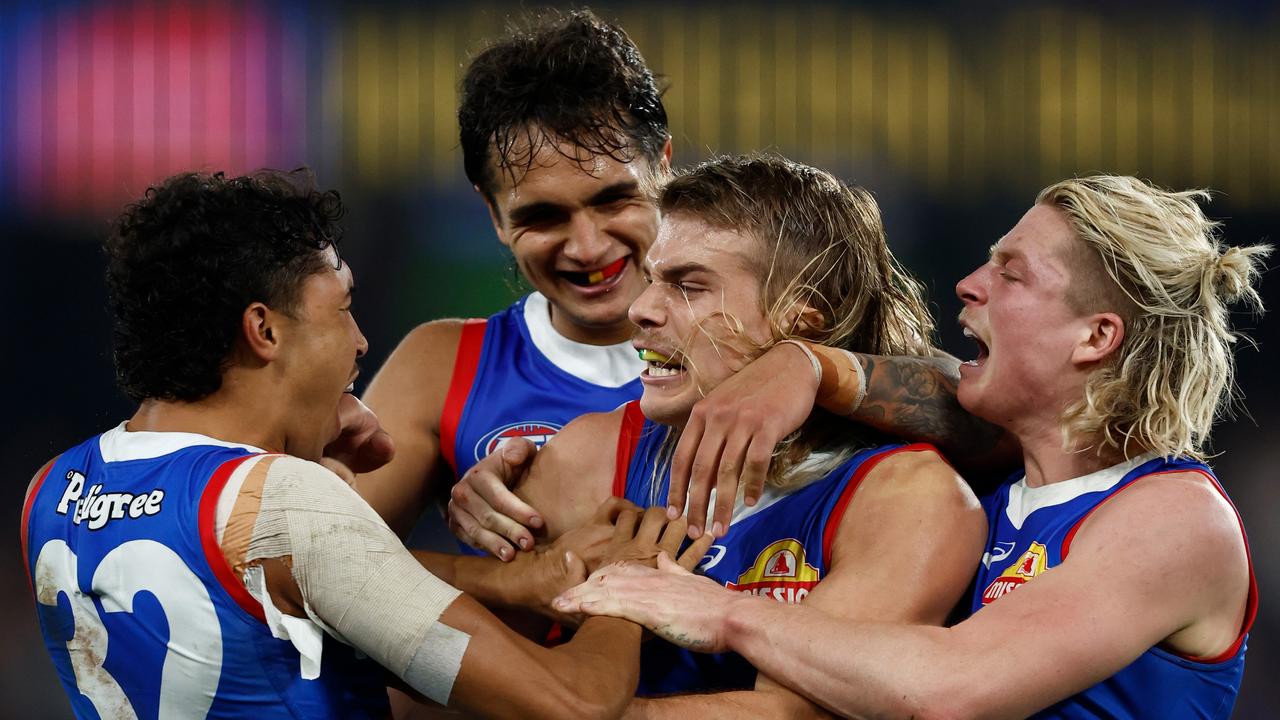 Bailey Smith (middle) celebrates a goal with teammates. Picture: Michael Willson/AFL Photos via Getty Images