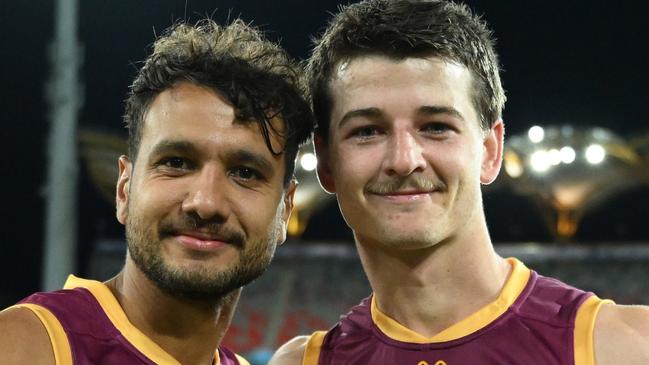 GOLD COAST, AUSTRALIA - JULY 27: Callum Ah Chee and Jaxon Prior of the Lions pose for a photograph after the round 20 AFL match between Gold Coast Suns and Brisbane Lions at People First Stadium, on July 27, 2024, in Gold Coast, Australia. (Photo by Matt Roberts/AFL Photos/via Getty Images)