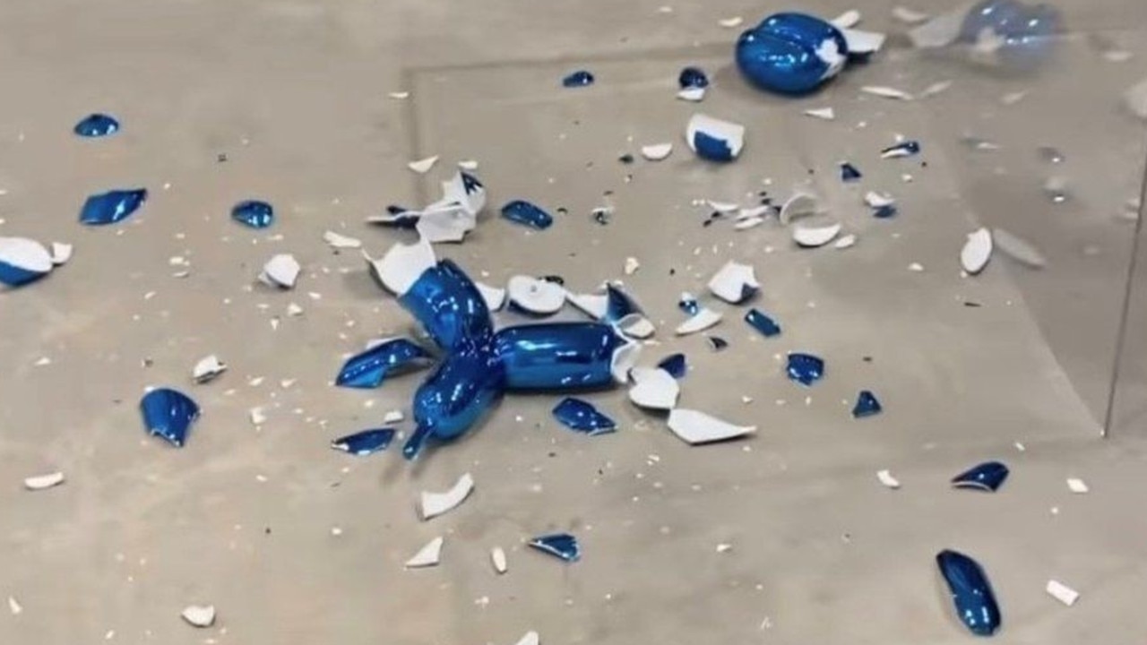 The shattered remains of one of Jeff Koons' balloon dog sculptures. Picture: Twitter