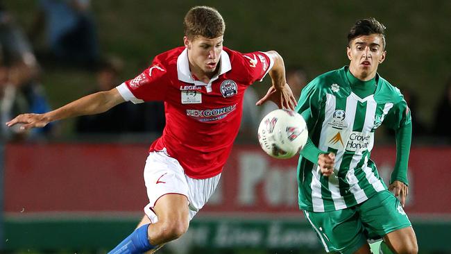 Nikola Jurkovic in action for North Geelong against Green Gully's Jem Berkant. Picture: Mark Stewart