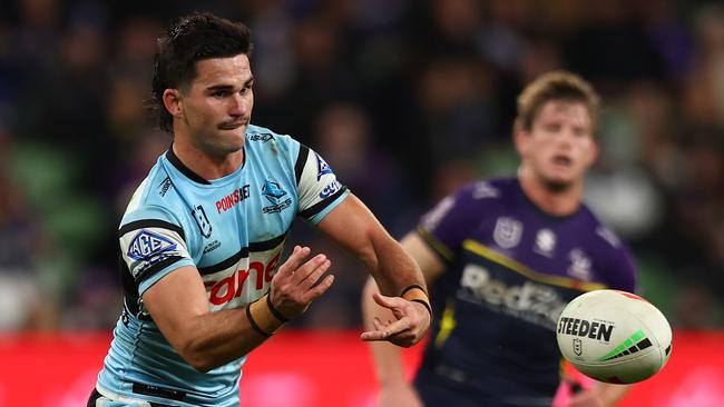 MELBOURNE, AUSTRALIA - MAY 11: Daniel Atkinson of the Sharks passes during the round 10 NRL match between Melbourne Storm and Cronulla Sharks at AAMI Park on May 11, 2024 in Melbourne, Australia. (Photo by Graham Denholm/Getty Images)