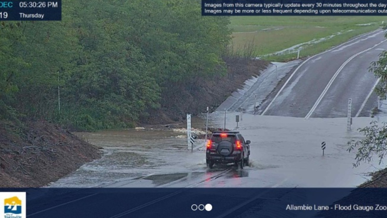 Allambie Lane has been flooded over and motorists have been warned not to cross.