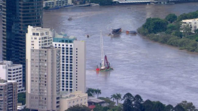 A pontoon carrying a crane broke free of its mooring on the Brisbane River on Monday afternoon.
