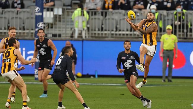 Hawthorn’s Jarman Impey grabs a mark in the Hawks’ remarkable comeback win against Carlton at Optus Stadium in Perth. Picture: Getty Images