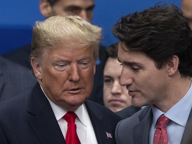 HERTFORD, ENGLAND - DECEMBER 04: U.S. President Donald Trump (L) ad Canadian Prime Minister Justin Trudeau (R) attend the NATO summit at the Grove Hotel on December 4, 2019 in Watford, England. France and the UK signed the Treaty of Dunkirk in 1947 in the aftermath of WW2 cementing a mutual alliance in the event of an attack by Germany or the Soviet Union. The Benelux countries joined the Treaty and in April 1949 expanded further to include North America and Canada followed by Portugal, Italy, Norway, Denmark and Iceland. This new military alliance became the North Atlantic Treaty Organisation (NATO). The organisation grew with Greece and Turkey becoming members and a re-armed West Germany was permitted in 1955. This encouraged the creation of the Soviet-led Warsaw Pact delineating the two sides of the Cold War. This year marks the 70th anniversary of NATO. (Photo by Dan Kitwood/Getty Images)