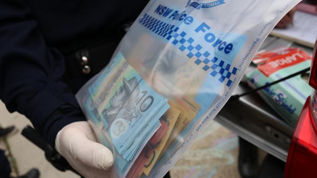 Cash allegedly found during the raid. Picture: NSW Police Force. 