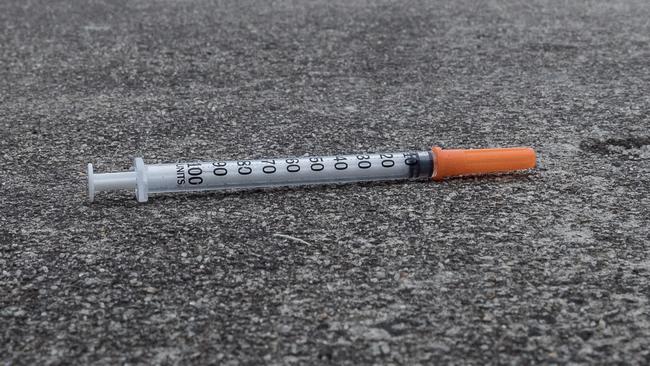 Drug use in Richmond. Residents in Richmond call for safe injecting rooms as drug use in the area is conducted in the open. Discarded used needles are commonplace in the carpark adjacent to a needle exchange centre in Richmond. Picture: Jake Nowakowski