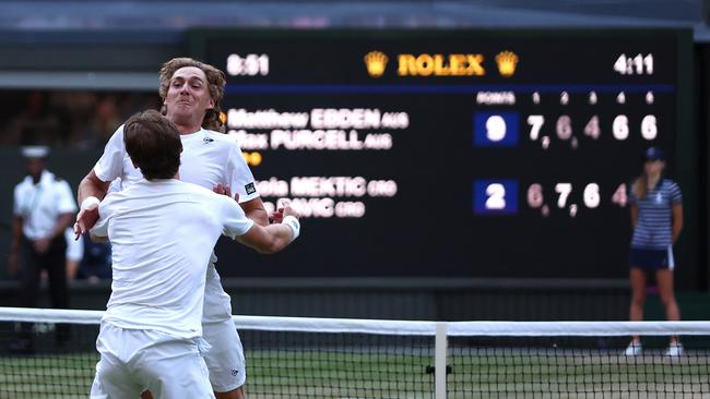 Matthew Ebden of Australia and partner Max Purcell of Australia celebrate after winning match point. Picture: Clive Brunskill/Getty Images