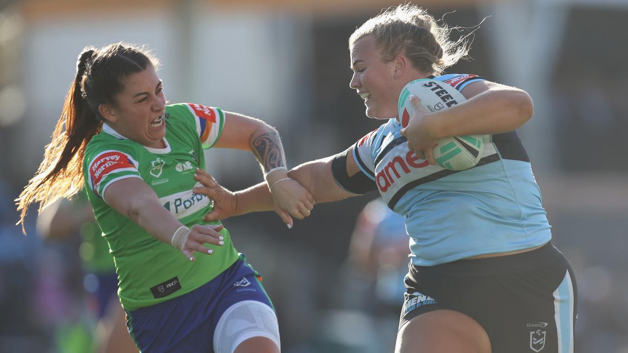 Ellie Johnston on the charge for the Sharks. The NRLW has suffered as a result of the player’s media boycott. Picture: Getty Images