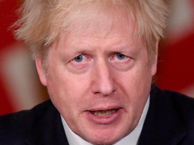 LONDON, ENGLAND - DECEMBER 19: Britain's Prime Minister Boris Johnson speaks during a news conference in response to the ongoing situation with the coronavirus disease (COVID-19) pandemic, inside 10 Downing Street on December 19, 2020 in London, England. The Prime Minister announces tier four restrictions for London and the South East. (Photo by Toby Melville - WPA Pool / Getty Images)