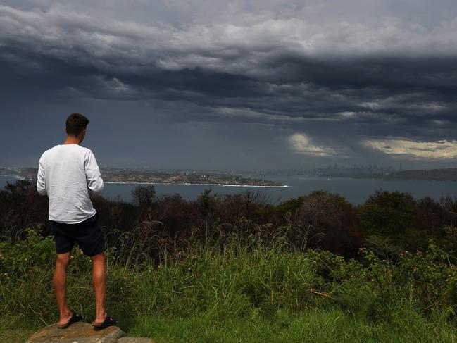 A line off storms has just moved through Sydney,  only areas of heavy rain and some lightning was observed . See here passing over Manly beach and the harbour .picture John Grainger