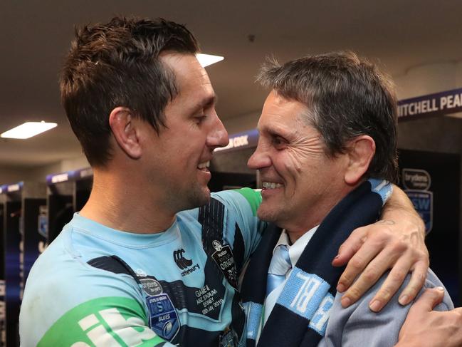 NSW's Mitchell Pearce celebrates victory in the room with his father Wayne Pearce after Game 3 of the State of Origin Series between NSW and QLD at ANZ Stadium, Homebush. Picture: Brett Costello