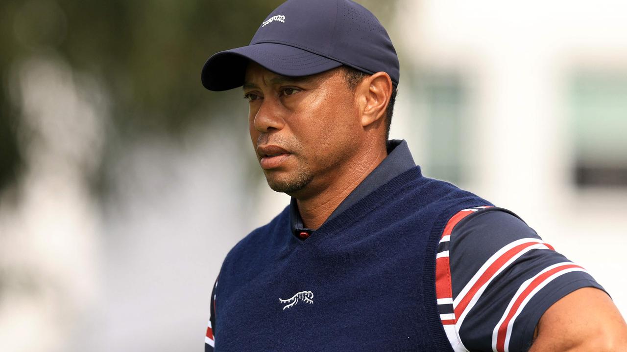 Tiger Woods with his new clothing line. Photo by Sean M. Haffey / GETTY IMAGES.