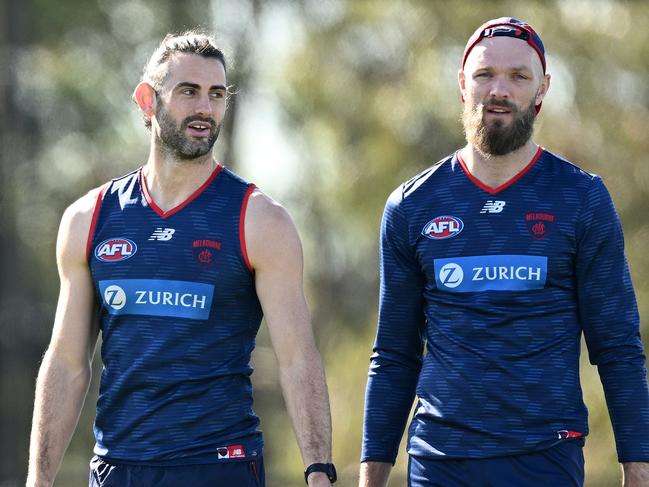 MELBOURNE, AUSTRALIA - SEPTEMBER 04: Brodie Grundy and Max Gawn of the Demons chat during a Melbourne Demons AFL training session at Casey Fields on September 04, 2023 in Melbourne, Australia. (Photo by Quinn Rooney/Getty Images)