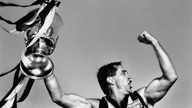 BEST 25 1990 … Tony Shaw celebrates Collingwoods 1990 premiership win, the first premiership since 1958. Picture: Mike Keating