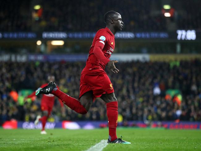 NORWICH, ENGLAND - FEBRUARY 15: Sadio Mane of Liverpool celebrates after scoring his team's first goal during the Premier League match between Norwich City and Liverpool FC at Carrow Road on February 15, 2020 in Norwich, United Kingdom. (Photo by Julian Finney/Getty Images)