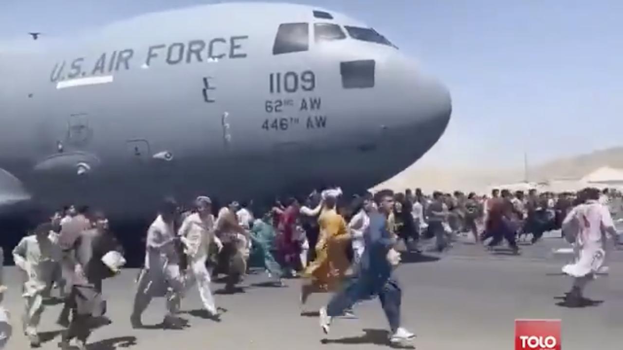 Desperate scenes at Kabul Airport showed civilians attempting to climb on board a US Air Force military jet. Mr Biden has promised to rescue some Afghans but the priority was American citizens and allies.