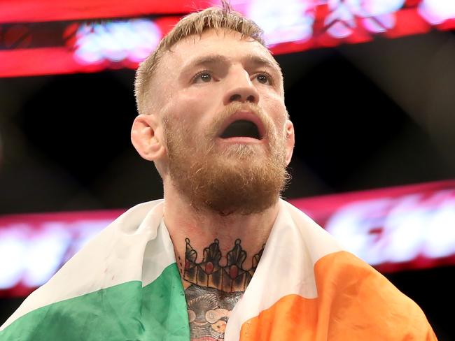 Conor McGregor, of Ireland, celebrates a win against Dennis Siver, of Germany, after their featherweight fight at UFC Fight Night, Sunday, Jan. 18, 2015 in Boston. McGregor won via 2nd round TKO. (AP Photo/Gregory Payan)