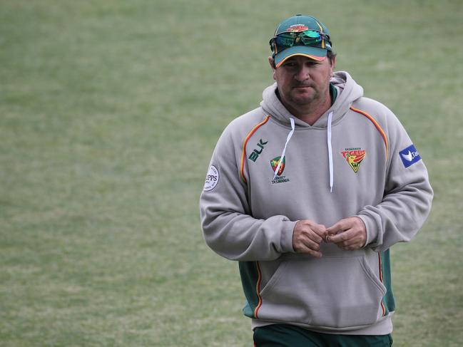 CRICKET: Shield Day 4, Tasmania vs. Queensland, Blundstone Arena. BYLINE: LUKE BOWDEN: Tasmanian coach Dan Marsh walks off the ground after Queensland defeated Tasmania