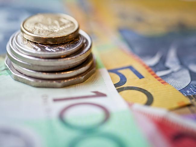 Stack of Australian dollars, cash money generic