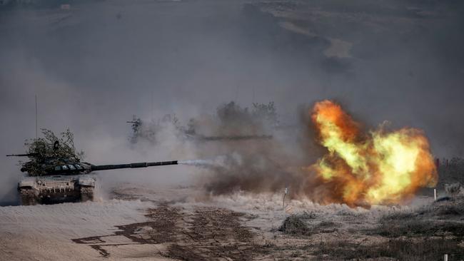 A T-72-B3 tank lets rip at the Raevsky range during an exercise in southern Russia this week. Picture: AFP
