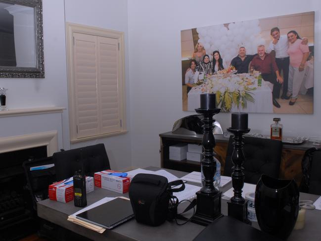 A large family portrait takes pride of place in Michael Ibrahim’s dining room.