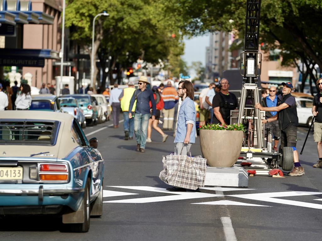 A Daniel Radcliffe body double filming “Escape from Pretoria” in Pirie St, Adelaide. Picture: AAP/Mike Burton