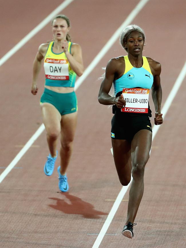 Shaunae Miller-Uibo of the Bahamas beats home Riley Day of Australia in their 200m semi-final last night. Photo: Getty Images