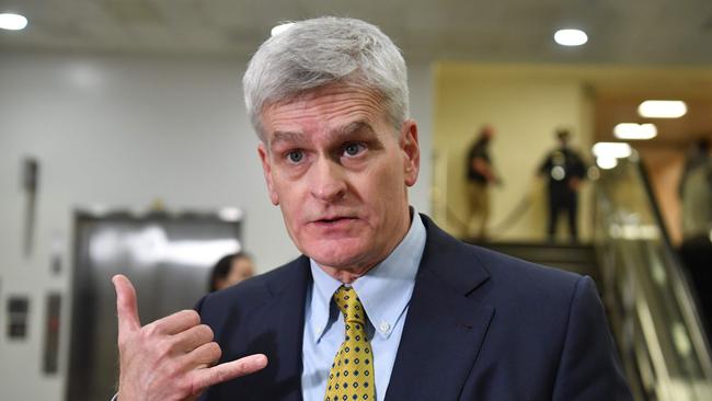 Republican US Senator Bill Cassidy speaks to the press as he arrives at the trial. Picture: AFP.