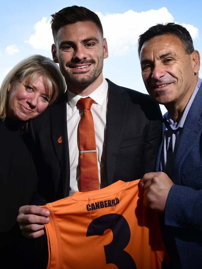 Coniglio with parents Jane and Sandro. Pic: AAP