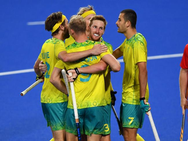 BIRMINGHAM, ENGLAND - AUGUST 06: Daniel Beale of Team Australia celebrates with team mates after scoring their sides third goal during the Men's Hockey - Semi-Final match between Australia and England on day nine of the Birmingham 2022 Commonwealth Games at University of Birmingham Hockey & Squash Centre on August 06, 2022 on the Birmingham, England. (Photo by Tom Dulat/Getty Images)