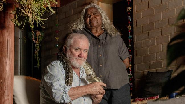 Jacinta Nampijinpa Price’s parents Dave and Bess with pet snake Bluey at their Alice Springs home. Picture: Liam Mendes