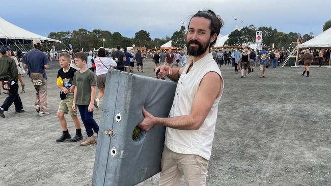 Anandan McEwed with massage table at Bluesfest 2023. Picture: Savannah Pocock