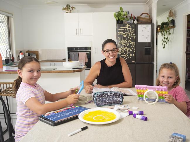 AUSNEWSMother Charlotte McArthur and her two daughters who she is home schooling. Daughters are Vienna, 8 and Cleo, 7.Photographed at home in Varsity Lakes, Gold Coast.Qld