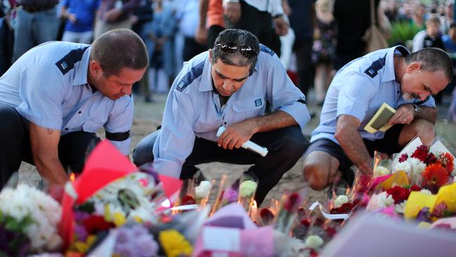 Brisbane city council drivers gathered at a memorial for the slain bus driver in Moorooka Saturday night. Pic: Jack Tran