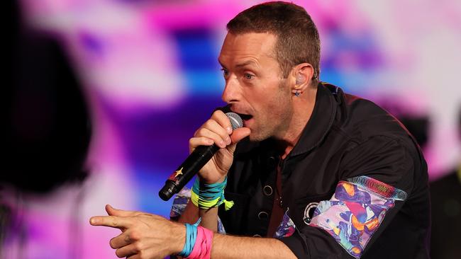 Chris Martin of Coldplay performs on stage at Optus Stadium on Saturday night. Picture: Paul Kane/Getty