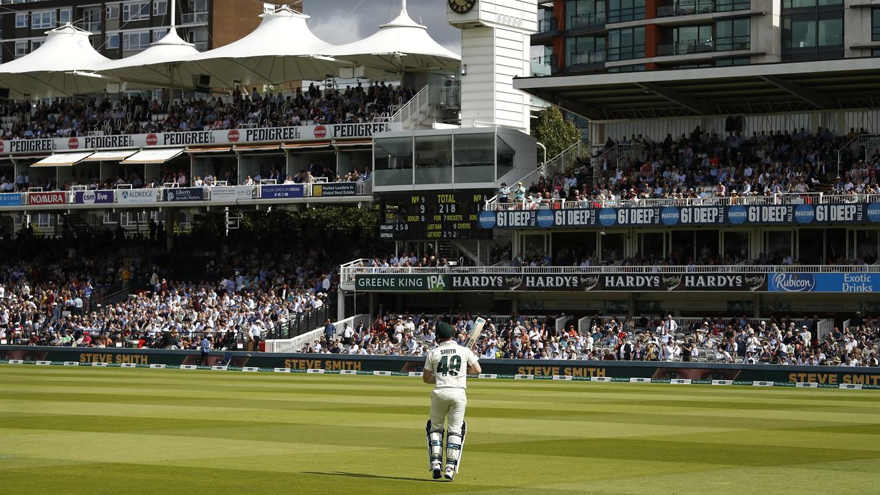 A brave Steve Smith walks back out to bat after after he retired hurt. Picture: Getty Images