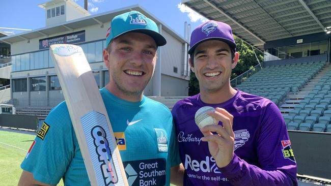 Queensland club cricket rivals Josh Brown (Heat) and Paddy Dooley (Hurricanes).