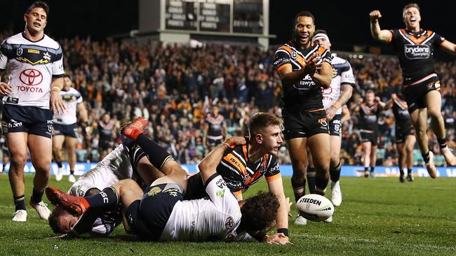 Paul Momirovski charges over for a try. (Photo by Mark Metcalfe/Getty Images)