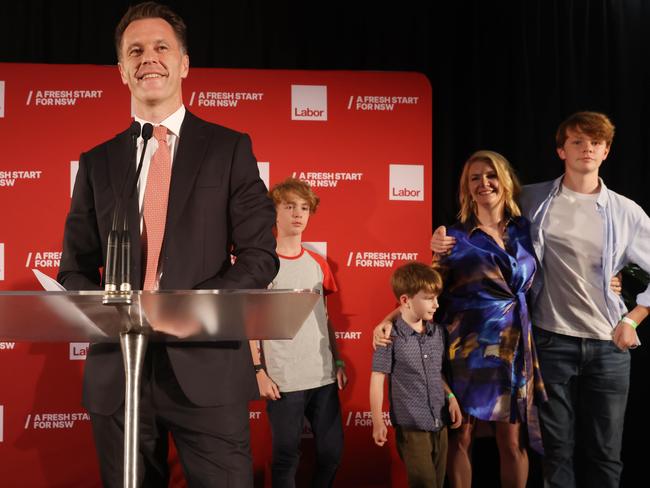 NSW Labor leader, Chris Minns with his wife Anna and the kids after winning the election. Picture: David Swift